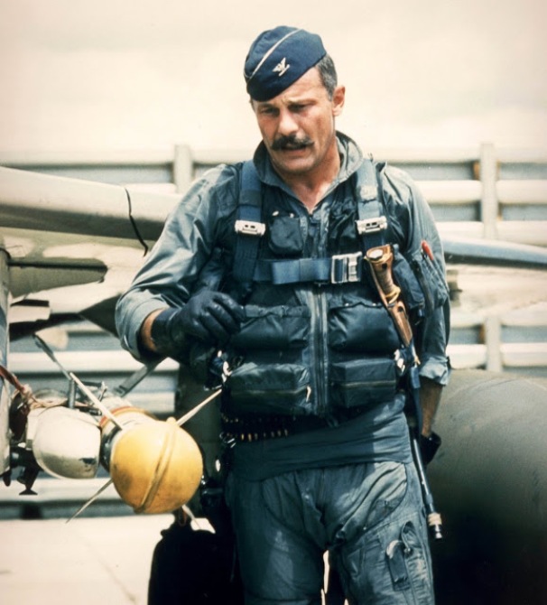 Air Force Col. Robin Olds, in Southeast Asia - 1967- commander of the 8th Tactical Fighter Wing, preflights his F-4C Phantom. Col. Olds has shot down four enemy MiG aircraft in aerial combat over North Vienam. (U.S. Air Force Photo)